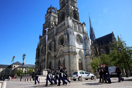 Soldiers march in front of Orleans cathedreal