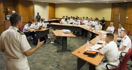 180509-N-MW280-219 SINGAPORE (May 9, 2018) Officers of U.S. 7th Fleet and the Republic of Singapore Navy take part in staff talks at RSS Singapura - Changi Naval Base. U.S. 7th Fleet seeks to strengthen relationships and partnerships throughout the Indo-Pacific Region which 7th Fleet has patrolled for more than 75 years, promoting and enhancing regional security and stability.