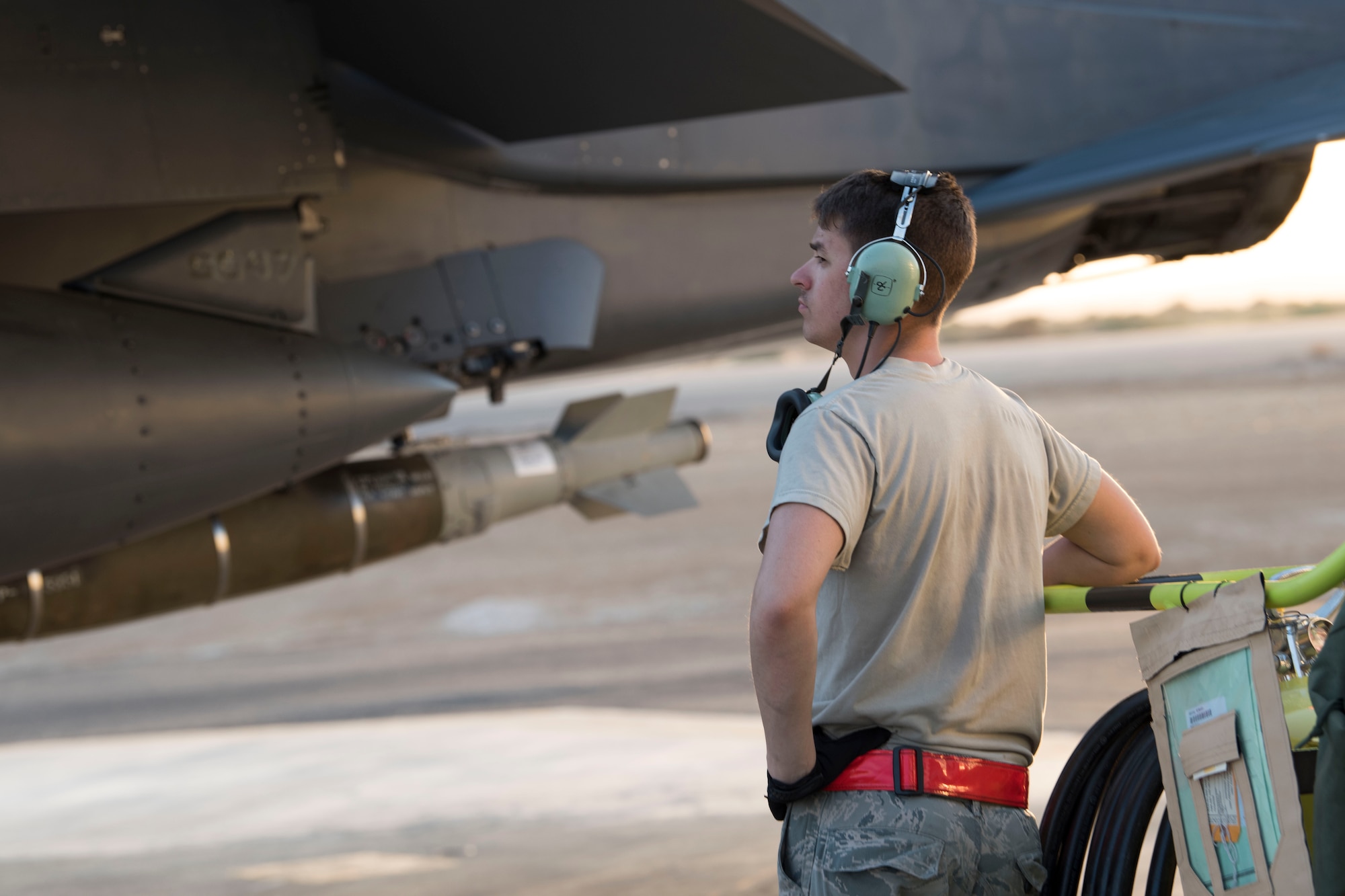 A 332nd Expeditionary Maintenance Squadron Airman observes an F-15E Strike Eagle during its engine performance checks April 8, 2018, at an undisclosed location in Southwest Asia.