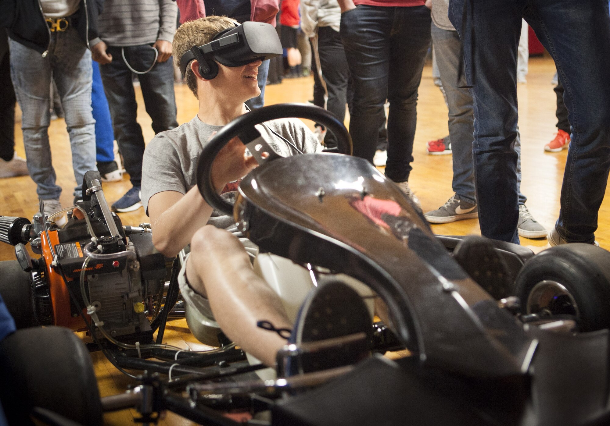A participant explores virtual reality capabilities in gaming software during the sixth annual Full-Throttle STEM® at Eldora Day in Rossburg, Ohio, May 8. Students from seven local high schools showcased their STEM-related projects, including their modeling and simulation-based work, and then competed in a remote-controlled (RC) car race at Eldora Speedway.