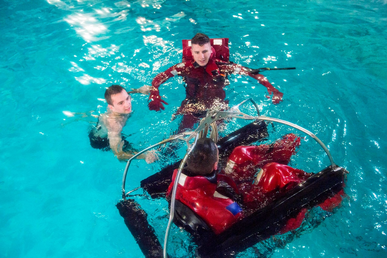 Coast Guard Academy cadets test out their new rescue basket design