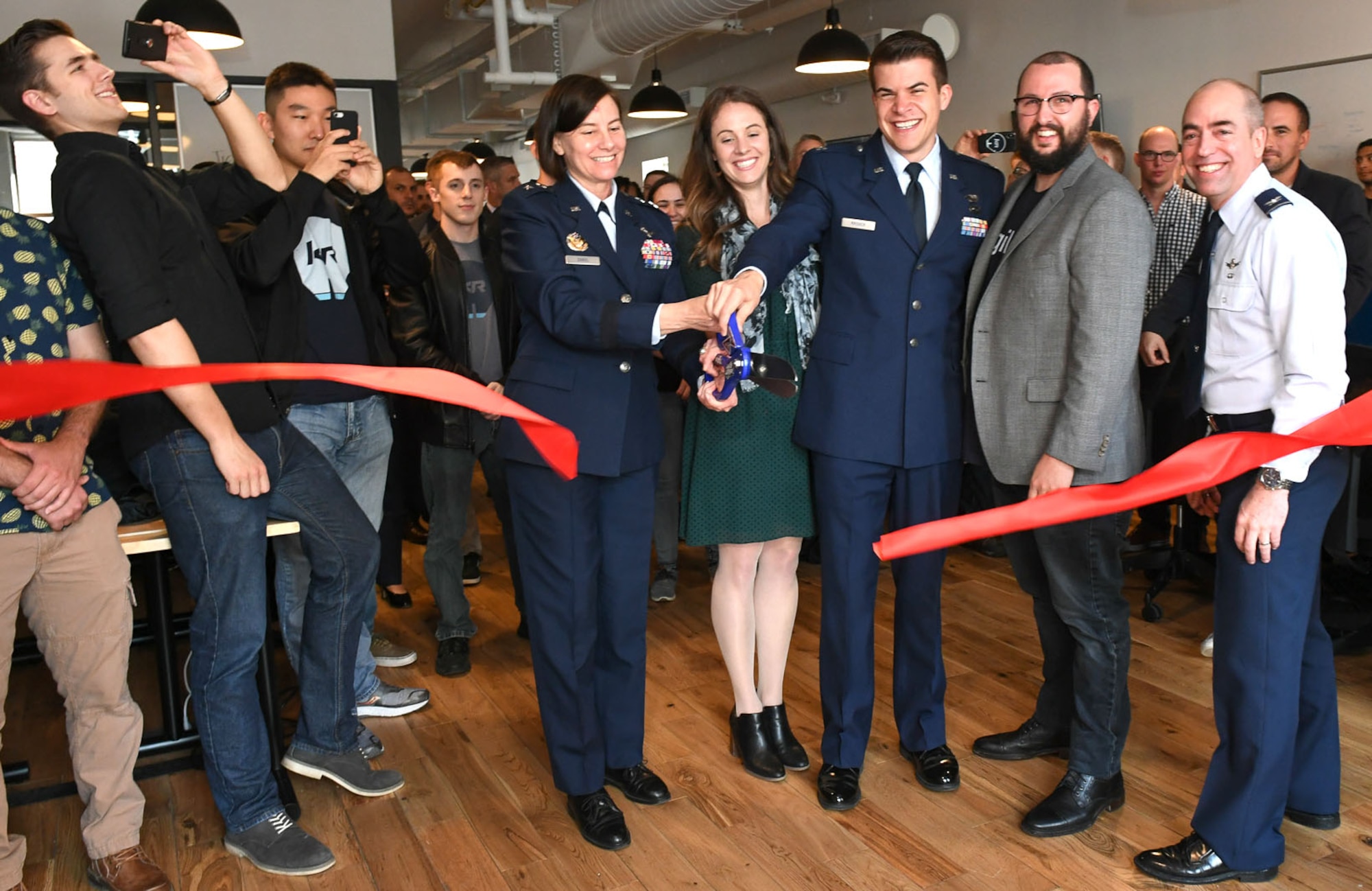 Maj. Gen. Sarah Zabel, the Air Force’s director of Information Technology Acquisition Process Development at the Pentagon, cuts the ribbon for the Kessel Run Experimentation Lab opening in Boston May 7