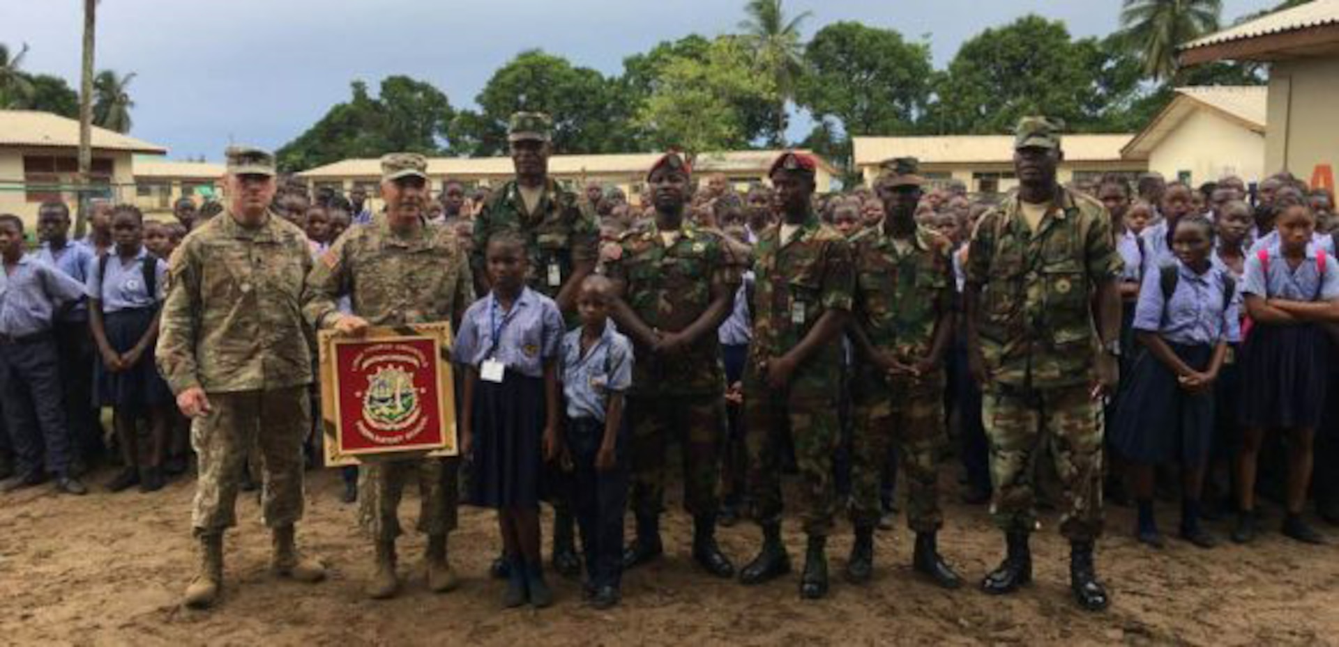 During a visit to the Linda Thomas Greenfield Preparatory School, Maj. Gen. Gregory Vadnais, the adjutant general of the Michigan National Guard, was presented with a plaque in appreciation of his support to the Edward Binyah Kesselly facility and the families of the Armed Forces of Liberia.  The children greeted him in their classrooms and showed him what they were learning.