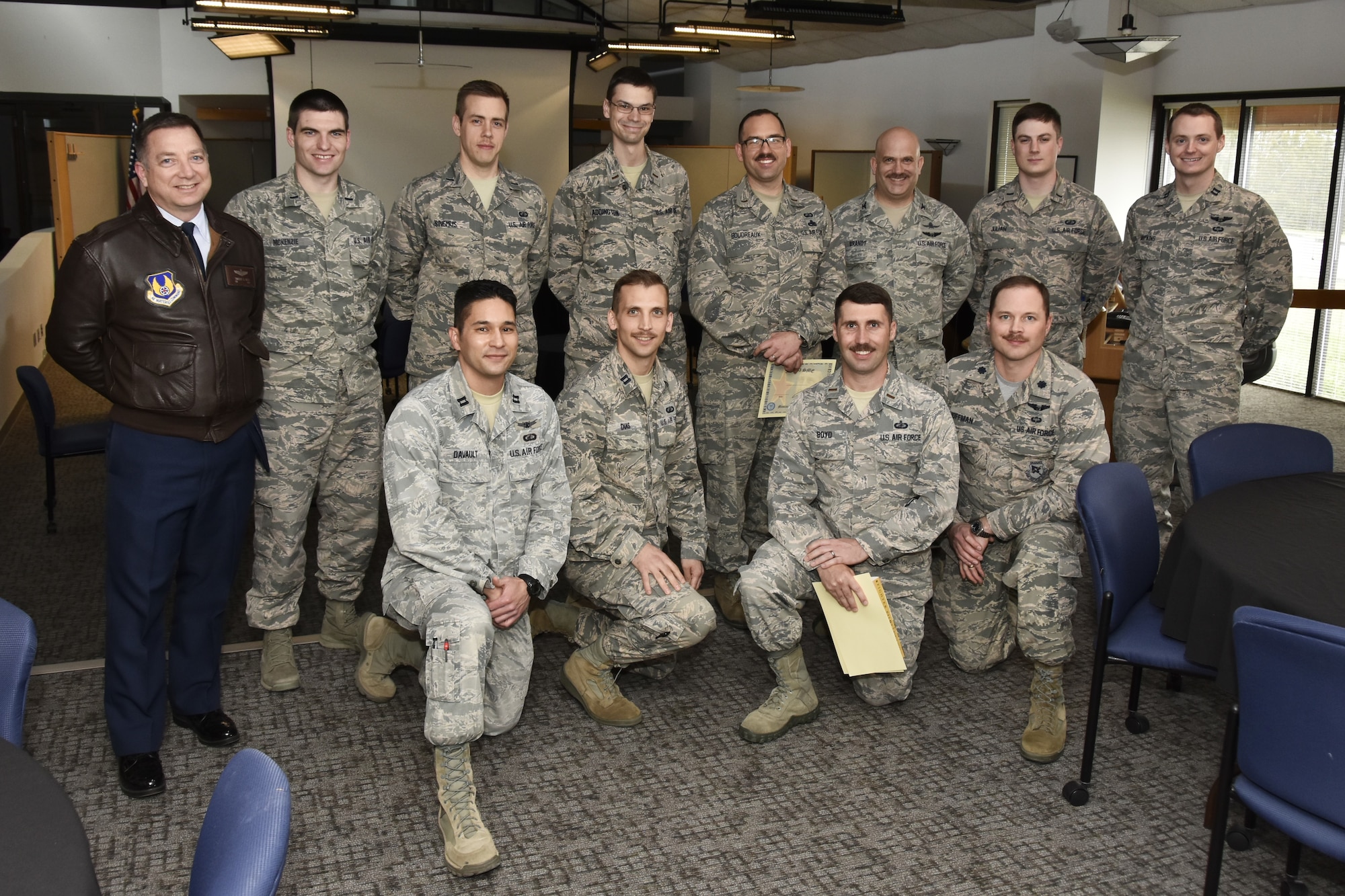 Arnold Air Force Base Company Grade Officers Council display their mustaches in honor of Mustache March at the Gossick Leadership Center March 30, 2018. Mustache certificates were awarded to 1st Lt. Benjamin Sinemus – The “Barely There” award (back row, third from left), 2nd Lt. Ryan Boudreaux – 36-2903 SME award (back row, fifth from left), Col. Michael Brandt – 36-290…Never Heard of Her award (back row, sixth from left), Capt. Jonathan Dias – The “Free Candy” award (front row, second from left) and 2nd Lt. Charles Boyd – “Room ‘Tench Hut” award (front row, third from left). Also pictured, back row: Col. Timothy West, 1st Lt. John McKenzie, Sinemus, 2nd Lt. Nicholas Addington Ramosechandi, Boudreaux, Brandt, 1st Lt. Thomas Julian, Capt. Adam Hopkins; front row: Capt. Michael Davault, Dias, Boyd and Lt. Col. David Hoffman. (U.S. Air Force photo/Rick Goodfriend)