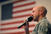 Lt. Col. Robert Marshall shares videos and images from his journey to the Mount Everest summit during the wingman Day opening ceremony at Schriever Air Force Base, Colorado May 4, 2018. The event was created to further build resilience skills so that Airmen can better handle stress, and bounce back from adversity. (U.S. Air Force photo by Kathryn Calvert)