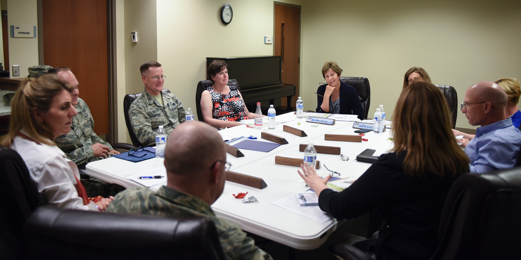 Lauren Hyten, spouse of Gen. John E. Hyten, U.S. Strategic Command commander, explains the importance of all helping agency programs at the base chapel May 9, 2018 on Buckley Air Force Base, Colorado. Program managers that attended the meeting represented Providing for Providers, the Key Spouse program, Continuum of Care and the Allied Family Integration Program. (U.S. Air Force photo by Airman 1st Class Michael D. Mathews)