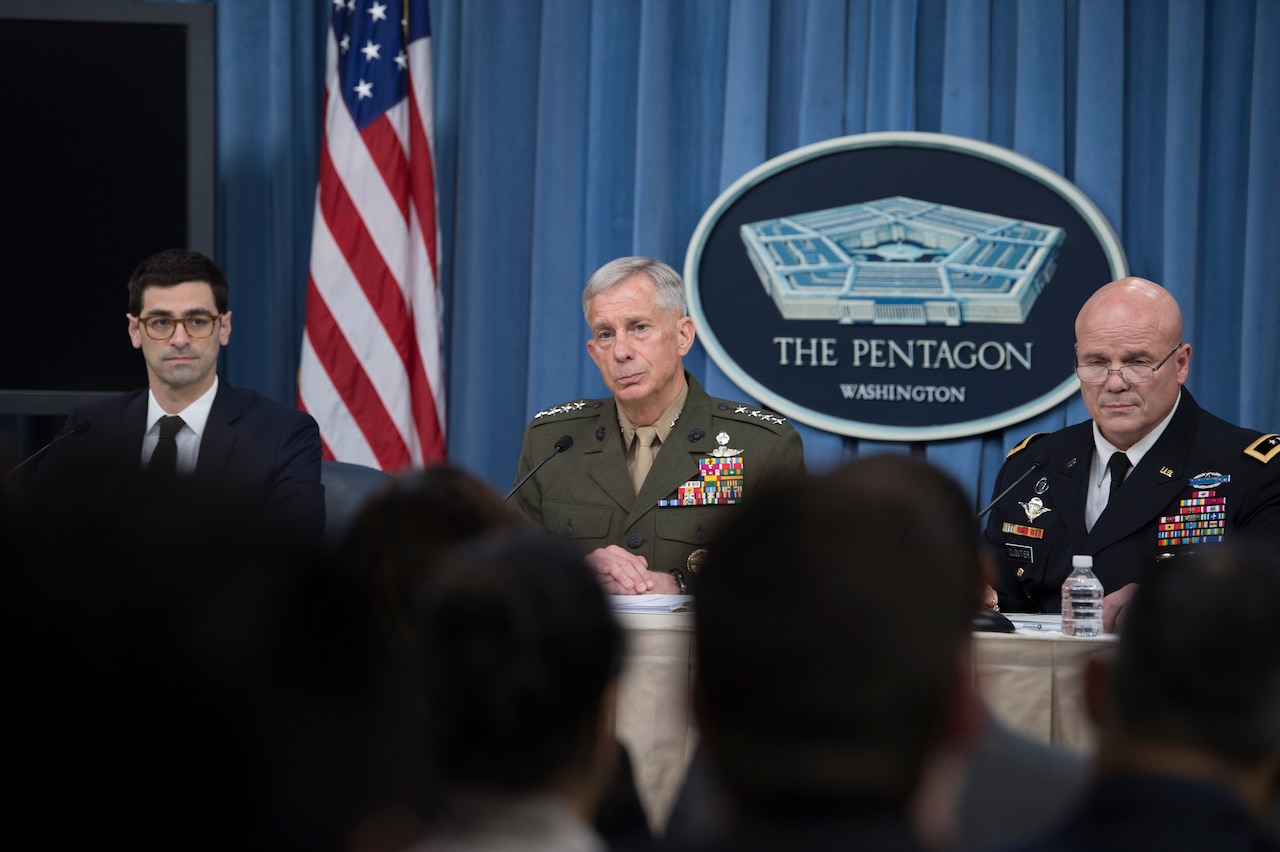 From left, Assistant Secretary of Defense for International Security Affairs Robert S. Karem; Marine Corps Gen. Thomas D. Waldhauser, commander of U.S. Africa Command; and Army Maj. Gen. Roger L. Cloutier Jr., Africom’s chief of staff and the investigating officer for the Army Regulation 15-6 investigation into the Oct. 4, 2017, attack in Niger, brief the Pentagon press corps on the results of the investigation, May 10, 2018. DoD photo by Navy Petty Officer 1st Class Kathryn E. Holm