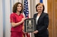 Lynda Rutledge (left), the Mobility and Training Aircraft Directorate Program Executive Officer, presented the 2017 Dr. James G. Roche Sustainment Excellence Award to Angela Micheal, T-38 Program Manager, May 8, 2018, at Hill Air Force Base, Utah. Micheal accepted the award on behalf of the Air Force Life Cycle Management Center T-38 Program Office. (U.S. Air Force photo)