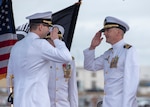 Cmdr. Heath E. Johnmeyer, right, relieves Cmdr. Eric J. Rozek during the Virginia-class fast-attack submarine USS Mississippi (SSN 782) change of command ceremony on the submarine piers in Joint Base Pearl Harbor-Hickam, May 8. (U.S. Navy photo by Mass Communication Specialist 2nd Class Michael Lee/Released)