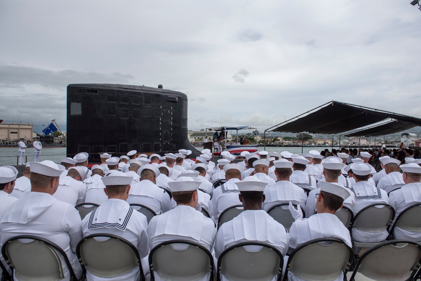 180508-N-LY160-0092 PEARL HARBOR (May 8, 2018) - The crew of the Virginia-class fast-attack submarine USS Mississippi (SSN 782) and guests attend a change of command ceremony on the submarine piers in Joint Base Pearl Harbor-Hickam, May 8. Cmdr. Heath E. Johnmeyer relieved Cmdr. Eric J. Rozek as Mississippi commanding officer. (U.S. Navy photo by Mass Communication Specialist 2nd Class Michael Lee/Released)