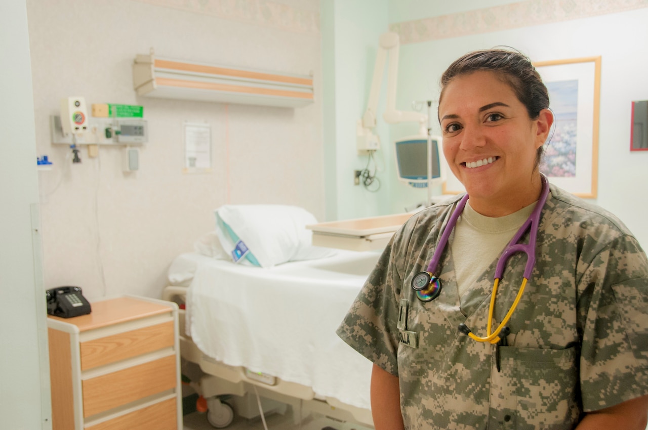 Army 1st Lt. Lizamara Bedolla, staff nurse at William Beaumont Army Medical Center’s surgical ward, stands in one of her unit’s inpatient rooms at Fort Bliss, Texas.