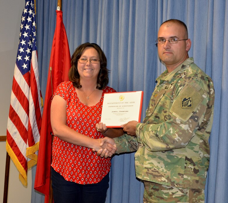 ALBUQUERQUE, N.M. -- The District's Deputy Commander Maj. John Miller presents Jamie Crawford with a certificate of achievement, May 7, 2018, for being selected as the District's Administrative Professional of the Year.