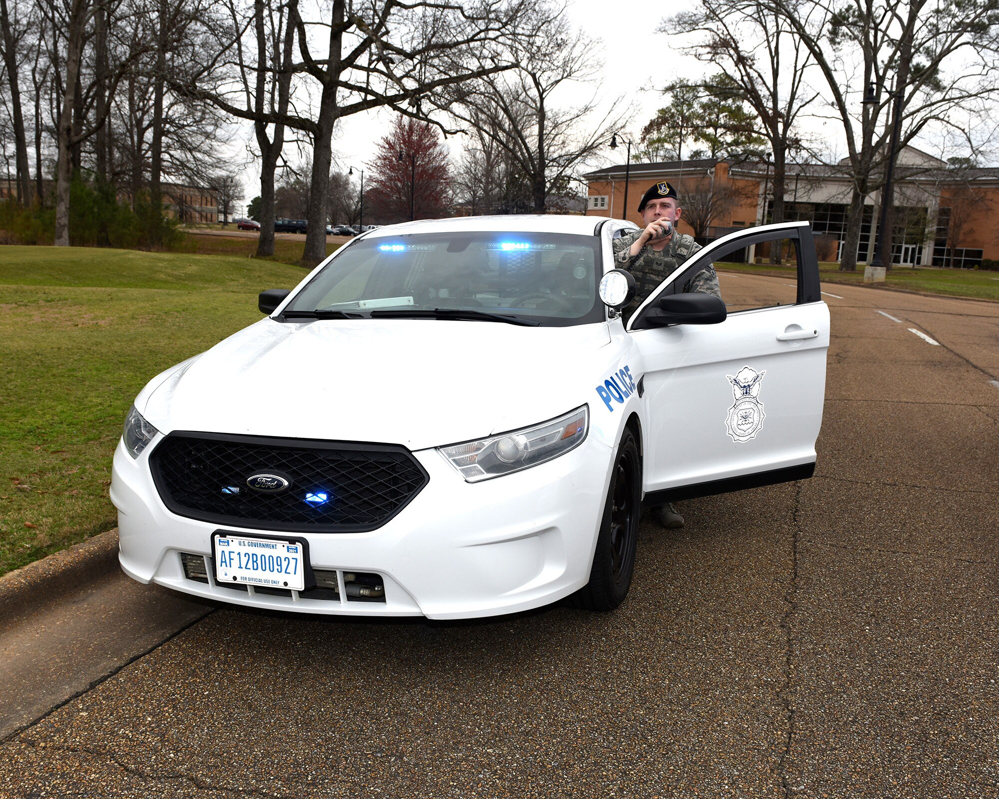 Airman 1st Class Jacob Lightsey, 14th Security Forces Squadron patrolman, checks a military ID Feb. 16, 2017, on Columbus Air Force Base, Mississippi. Security Forces defenders are the front line for protecting Airmen, their families and Air Force resources from harm. (U.S. Air Force photo by Elizabeth Owens)