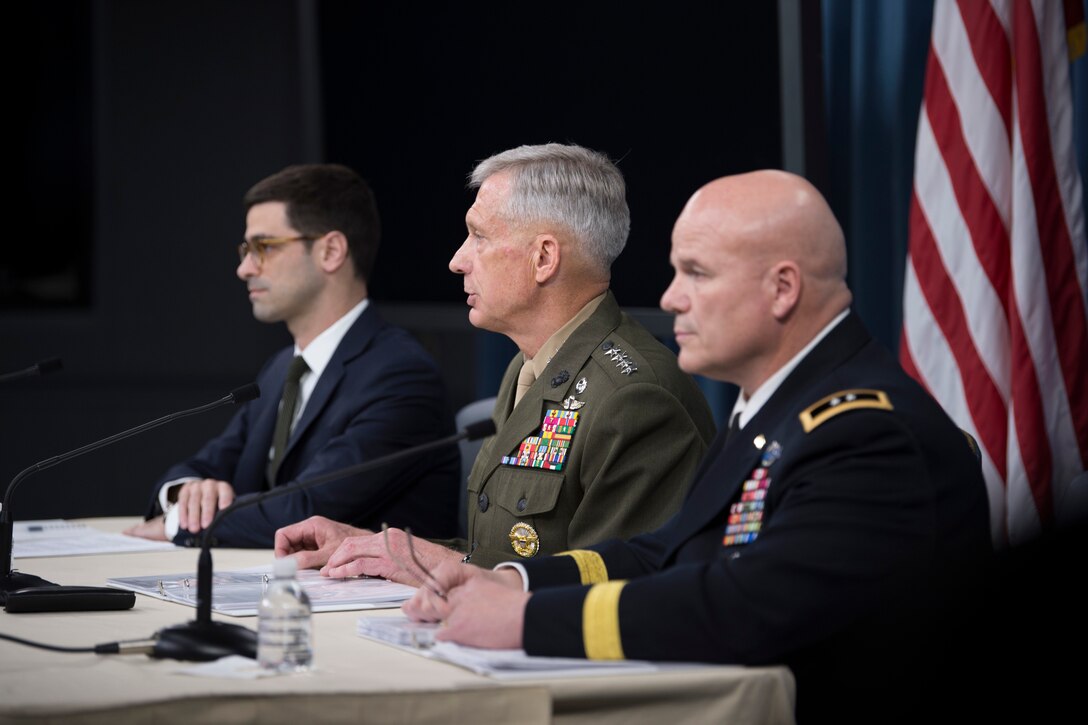 Defense officials brief reporters at the Pentagon.