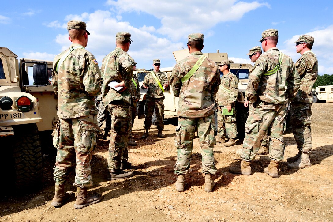 Soldiers receive a safety and mission briefing.