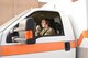 SrA Breanna Moore poses for a portrait in the ambulance her team uses when responding to emergency calls at Al Udeid Air Base, Qatar on May 5, 2018. Moore is assigned to the Expeditionary Medical Operations Squadron as an Aerospace Medical Technician, this is her second time deployed to Al Udeid in this capacity. (U.S. Air Force photo by Staff Sgt. Enjoli Saunders)