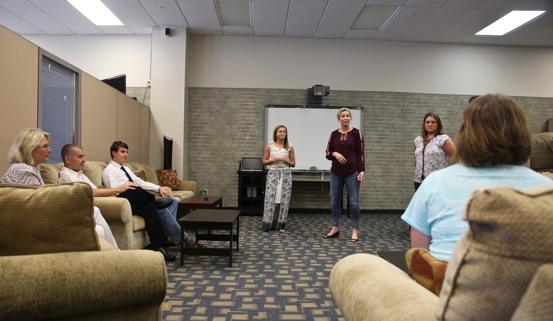 Julianna Miller and Brittany Jamieson speak to scholarship recipients and their family members aboard Marine Corps
Air Station Beaufort May 4. The presentation was hosted by the MCAS Beaufort Military Spouses Club. Jamieson is the
vice president of the MCAS Beaufort Military Spouses Club and Miller is an adviser with the club.