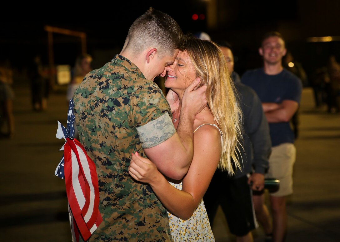 A Marine is welcomed home by a loved one after returning from a deployment May 7. Marines and Sailors of Marine
Fighter Attack Squadron 312 returned to Marine Corps Air Station Beaufort after being deployed aboard the USS
Theodore Roosevelt. The Checkerboards were deployed in support of combat operations overseas and maritime security
cooperation efforts in the U.S. 5th and 7th Fleet areas of operations.