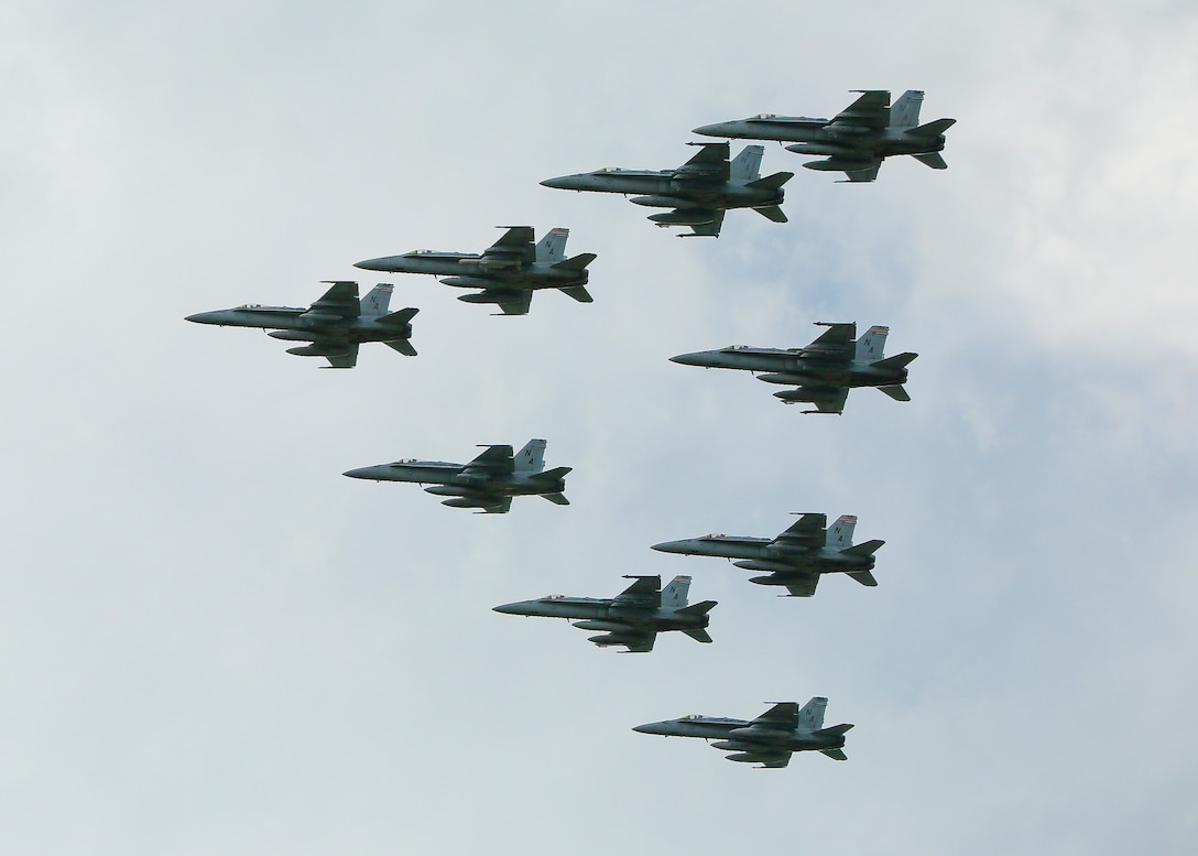 F/A-18C Hornets fly in formation before landing aboard Marine Corps Air Station Beaufort May 6. Marines and Sailors of Marine Fighter Attack Squadron 312 returned to Fightertown
after a deployment aboard the USS Theodore Roosevelt. The Checkerboards were deployed in support of combat operations overseas and maritime security cooperation efforts in
the U.S. 5th and 7th Fleet areas of operations.