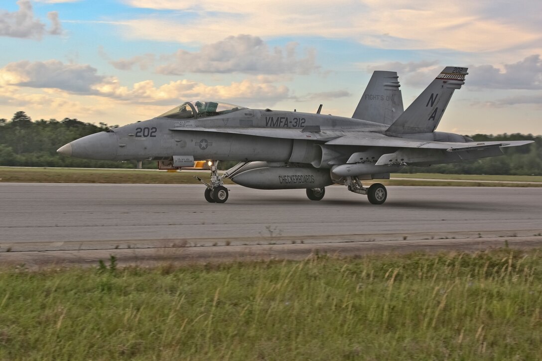 Marines and Sailors of Marine Fighter Attack Squadron 312 returned to Marine Corps Air Station Beaufort May 6-9 after a deployment. The Checkerboards were deployed
in support of combat operations overseas and maritime security cooperation efforts in the U.S. 5th and 7th Fleet areas of operations.