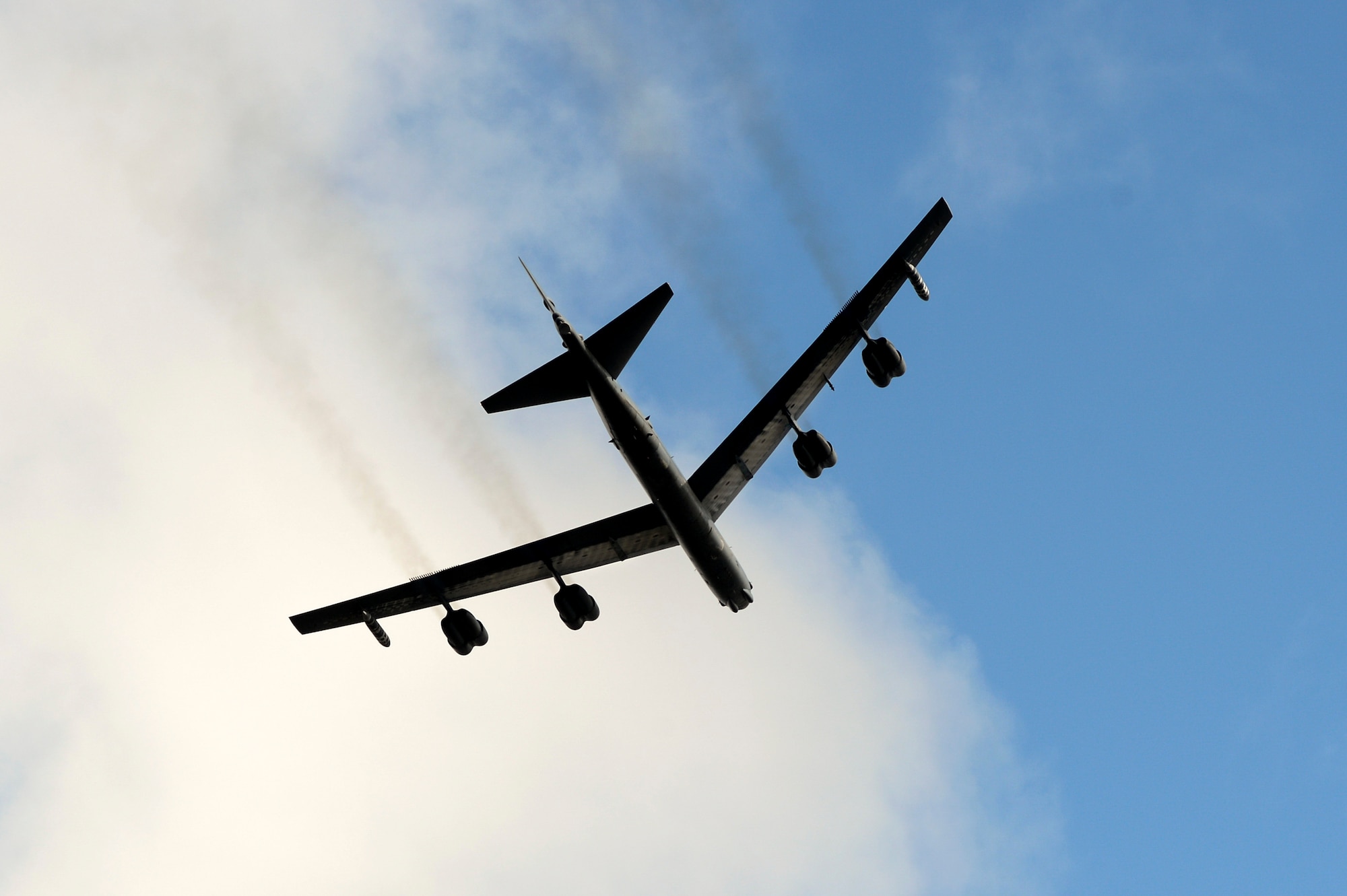 A U.S. Air Force B-52 Bomber makes a fly-by over a monument dedication ceremony for Lt. Gen. Frank Maxwell Andrews and his 13 crew members, May 3, 2018, in Keflavic, Iceland. The ceremony recognized the 75th anniversary of the crash of the B-24 Liberator, ‘Hot Stuff’ which resulted in the death of Andrews and his crew. (U.S. Air Force photo by Staff Sgt. Kenny Holston)