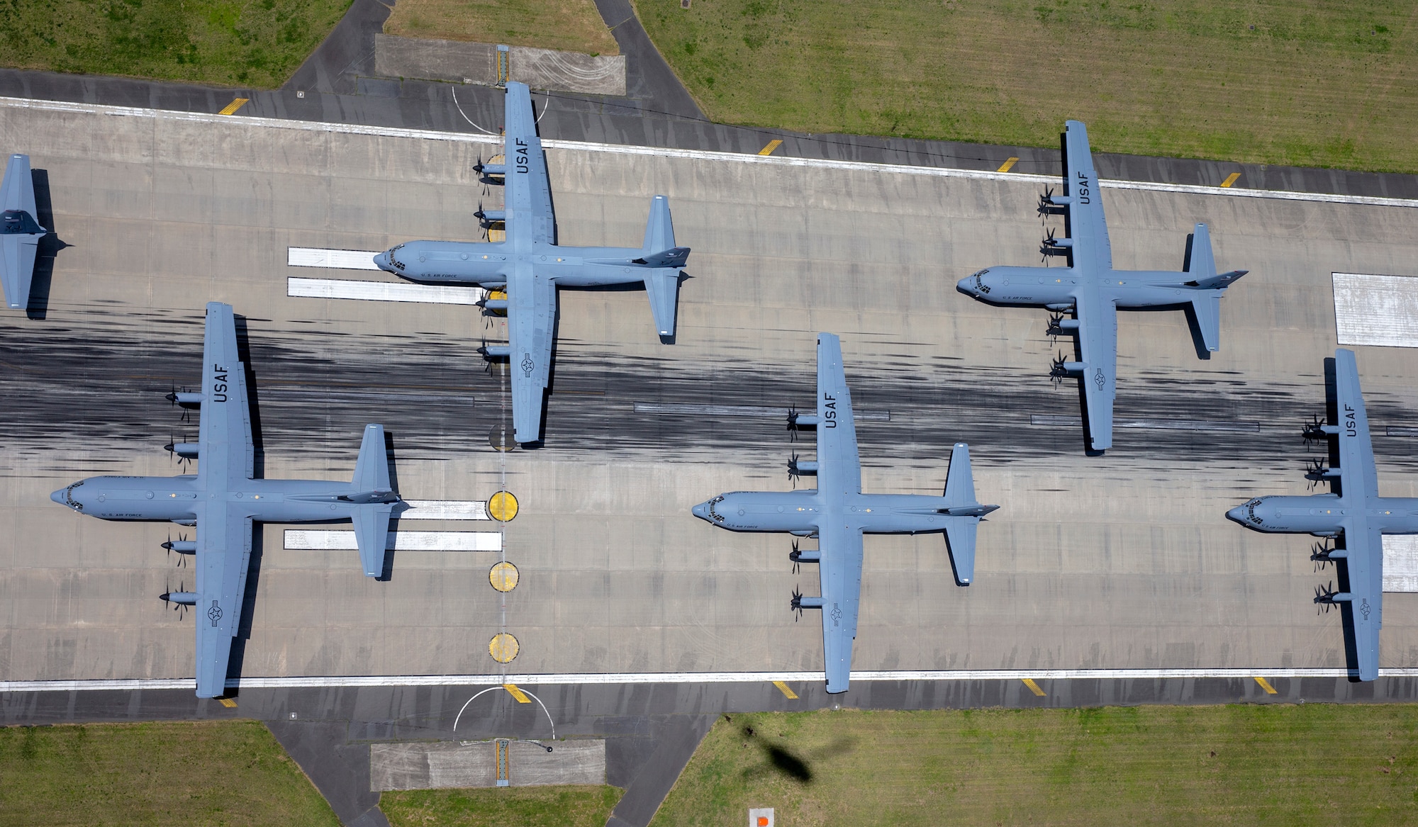 C-130J Super Hercules from the 36th Airlift Squadron prepare to take off during the 374th Airlift Wing Generation Exercise Elephant Walk at Yokota Air Base, Japan, May 4, 2018. The exercise was conducted in order to demonstrate the wing’s ability to rapidly deploy forces across Indo-Pacific region. The 374th AW maintains and operates the C-130J Super Hercules, C-12 Huron, and UH-1N Iroquois, making it the primary Western Pacific airlift hub for U.S. Air Force peacetime and contingency operations. (U.S. Air Force photo by Yasuo Osakabe)
