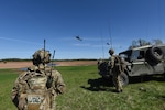U.S. Air Force Tech Sgt. Laurence Paradis, Tactical Air Control Party member with Oklahoma National Guard’s 146th Air Support Operations Squadron, advises Estonian Defense Force on Joint Terminal Attack Controller capabilities May 9, 2018, during Exercise HEDGEHOG 2018 in Southern Estonia. The TACP personnel served as advisers to the Estonian Defense Force to create combined fires between U.S. Army and multinational aviation assets.