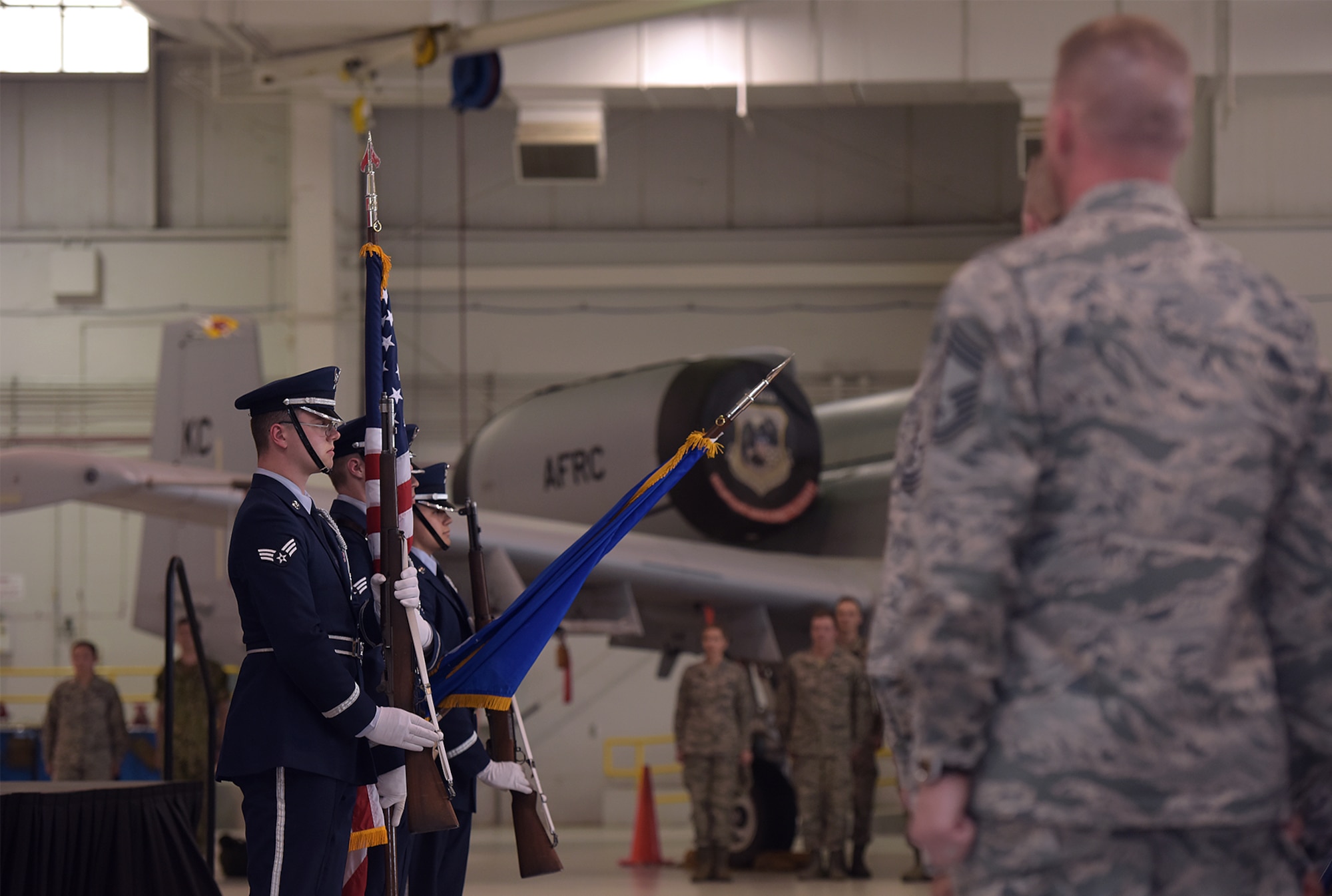 The Base Honor Guard presents the colors during the Omaha Trophy award ceremony at Whiteman Air Force Base, Mo., May 8, 2018. The Omaha Trophy was awarded to the men and women of the 509th Bomb Wing and 131st Bomb Wing  for executing the best Strategic Bomber Operations of 2017. (U.S. Air Force photos by Airman 1st Class Taylor Phifer)