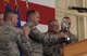 The 509th Bomb Wing and 131st Bomb Wing commanders hold up the Omaha Trophy during the award ceremony at Whiteman Air Force Base, Mo., May 8, 2018. The Omaha Trophy is awarded to units for excellence in strategic deterrence and global strike. Team Whiteman won the trophy for executing the best Strategic Bomber Operations of 2017.  (U.S. Air Force photos by Airman 1st Class Taylor Phifer)