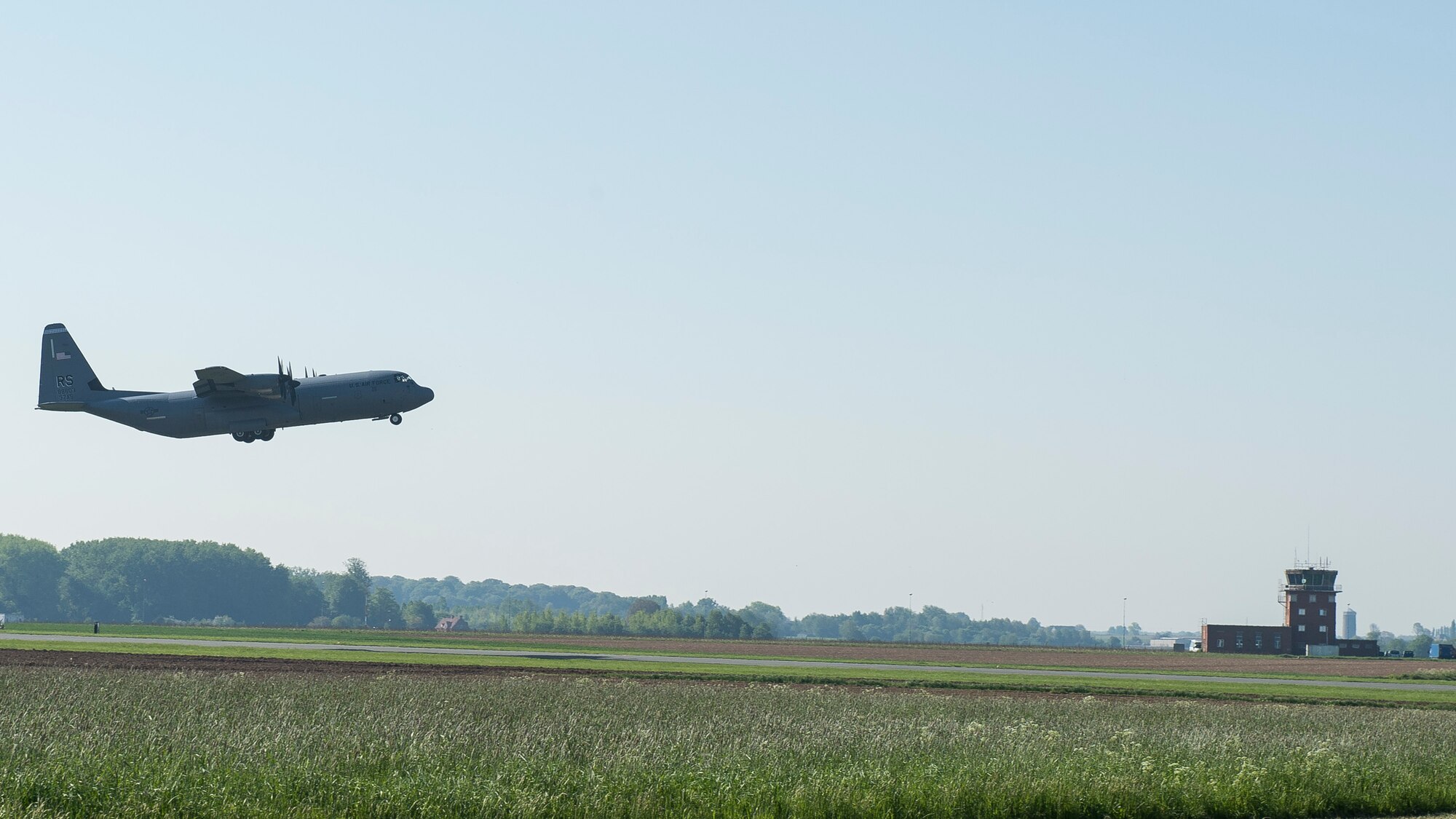 A C-130J Super Hercules from Ramstein Air Base, Germany, takes-off from Chievres Air Base, Belgium, May 4, 2018. The pilot performed multiple landings and take-offs to check the integrity of a new landing zone for future use to help further project U.S. air power. (U.S. Air Force photo by Staff Sgt. Jimmie D. Pike)