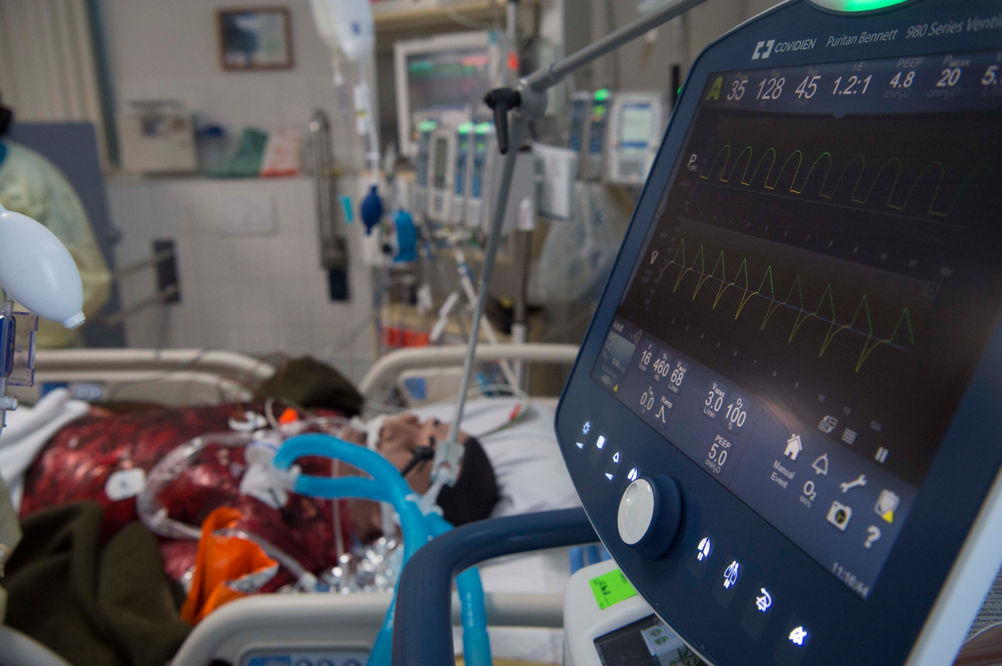 A mannequin receives simulated care during an 86th Medical Squadron burn victim evacuation exercise on Landstuhl Regional Medical Center, Germany, May 9, 2018. In the exercise scenario, two severely burned patients had been extracted from a burning building in Africa. The 86th MDS Critical Care Air Transport Team, Aeromedical Evacuation Squadron, and En-Route Patient Staging Flight transported them to Landstuhl Regional Medical Center. (U.S. Air Force photo by Senior Airman Elizabeth Baker)
