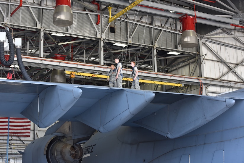 Airmen wear proper fall protection on top of an aircraft during training May 8, 2018, in the Aircraft Fuel System building at Joint Base Charleston, S.C. There are many variables involved in a fall that are outside of a worker’s control, such as working conditions, the specific job site, and human error. Wearing the proper PPE helps to prevent and reduce as many accidents as possible.