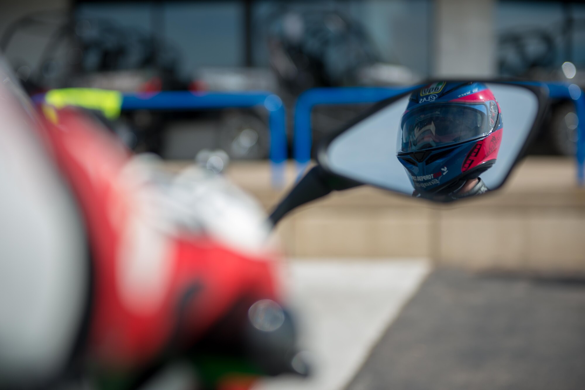 Chief Master Sgt. John Grutzmacher, from the 96th Airlift Squadron, prepares to ride his motorcycle on May 6. Per AFI 91-207, personal protective equipment (PPE) consists of long sleeves, long pants, close toed shoes, helmet and goggles, and ideally some high-visibility and/or reflective material. (U.S. Air Force photo by Tech Sgt. Trevor Saylor)