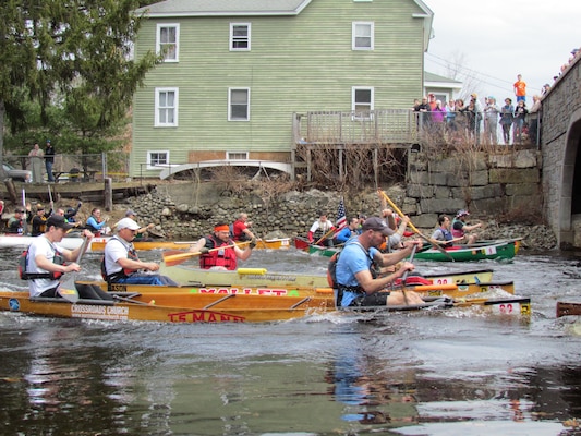 Rat Race participants paddle down the Miller River.  Tully Lake and Birch Hill Dam performed water releases for the popular local race.  200 paddlers participated and 500 spectators watched the event.