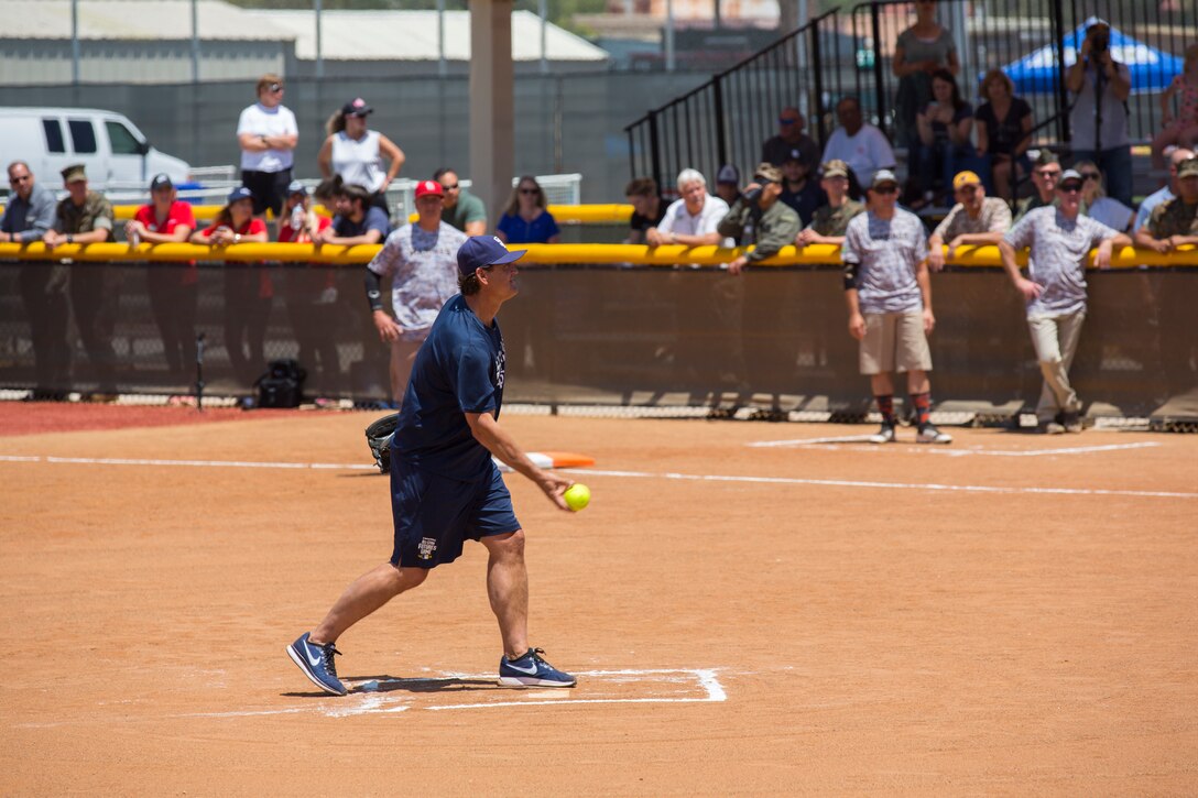 Trevor Hoffman, baseball Hall of Famer and a San Diego Padres Alumni, throws a pitch during a softball game between San Diego Padres Alumni and Marine Corps Air Station Miramar’s softball team at MCAS Miramar, Calif., May 10. The Padres Alumni came to demonstrate their support for the military with spirited competition and to thank the service members of MCAS Miramar for their service. (U.S. Marine Corps photo by Cpl. Daniel Auvert/Released)