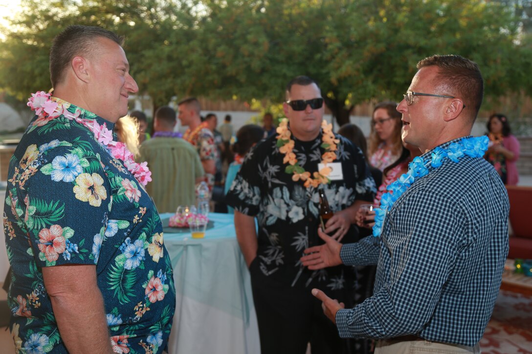 Guests enjoy themselves at the Desert Knights gala at Quarters One aboard the Marine Corps Air Ground Combat Center, Twentynine Palms, Calif., May 4, 2018. The Desert Knights gala was held to honor law enforcement and legal entities aboard the base and in the surrounding community. (U.S. Marine Corps photo by Lance Cpl. Preston L. Morris)
