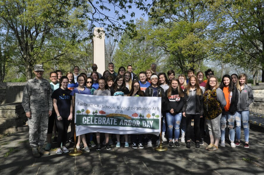 Col. Bradley McDonald, commander of the 88th Air Base Wing, stands with 32 children who planted 300 seedlings May 7 at the Wright Memorial in Area B to honor Arbor Day. Fairborn City Schools, the National Park Service and the 88th Civil Engineering Group partnered this year to coordinate the project. (U.S. Air Force photo/W. Eugene Barnett Jr.)