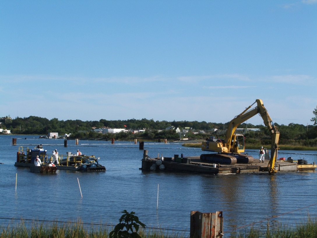 Dredging operations at the New Bedford Harbor Superfund Site.