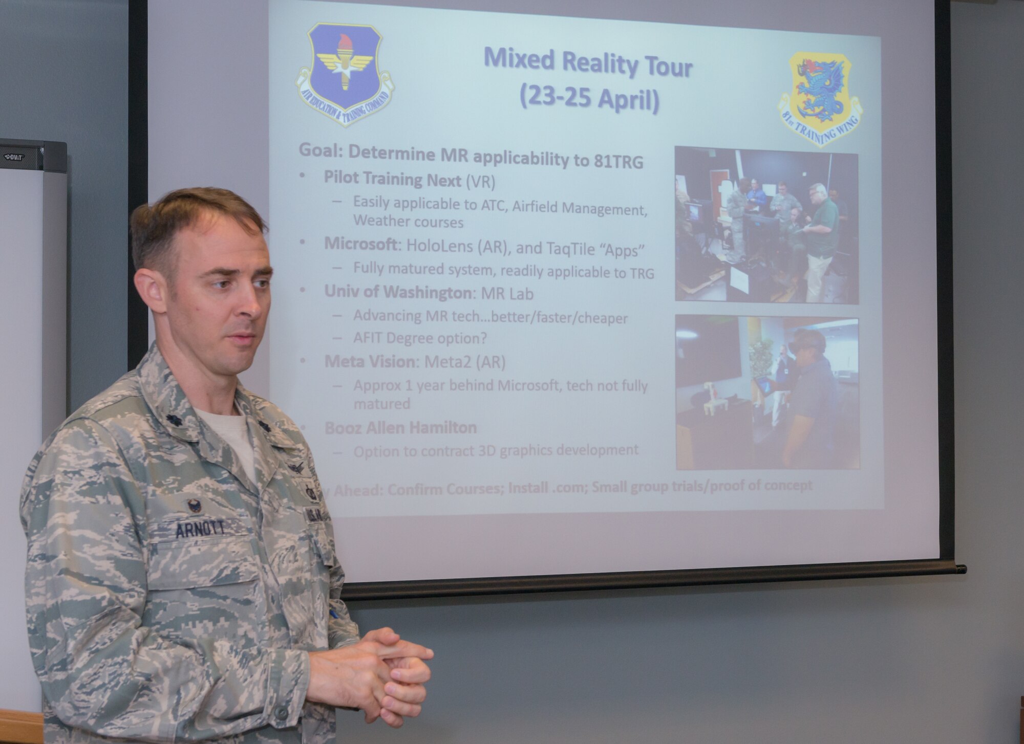 U.S. Air Force Lt. Col. Stephen Arnott, 81st Training Support Squadron commander, briefs Randy Mayberry, Continuum of Learning Engagement Team representative, and Masoud Rasti, Headquarters Air Education and Training Command business relations manager, on the benefits of mixed reality in the Trainer Development Center at Keesler Air Force Base, Mississippi, May 8, 2018. Mayberry and Rasti’s visit was to gauge current technology, training and to discuss what issues could be solved through funding. (U.S. Air force photo by Andre’ Askew)