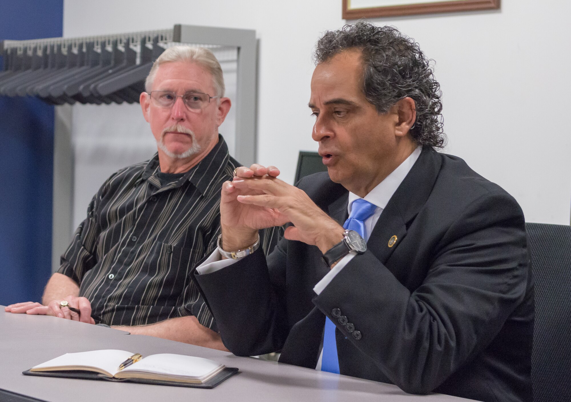 Dr. Randy Mayberry, Continuum of Learning Engagement Team representative, left, and Masoud Rasti, Headquarters Air Education and Training Command business relations manager, brief service members on innovation and training in Allee Hall at Keesler Air Force Base, Mississippi, May 8, 2018. Mayberry and Rasti’s visit was to gauge current technology, training and to discuss what issues could be solved through funding.  (U.S. Air force photo by Andre’ Askew)