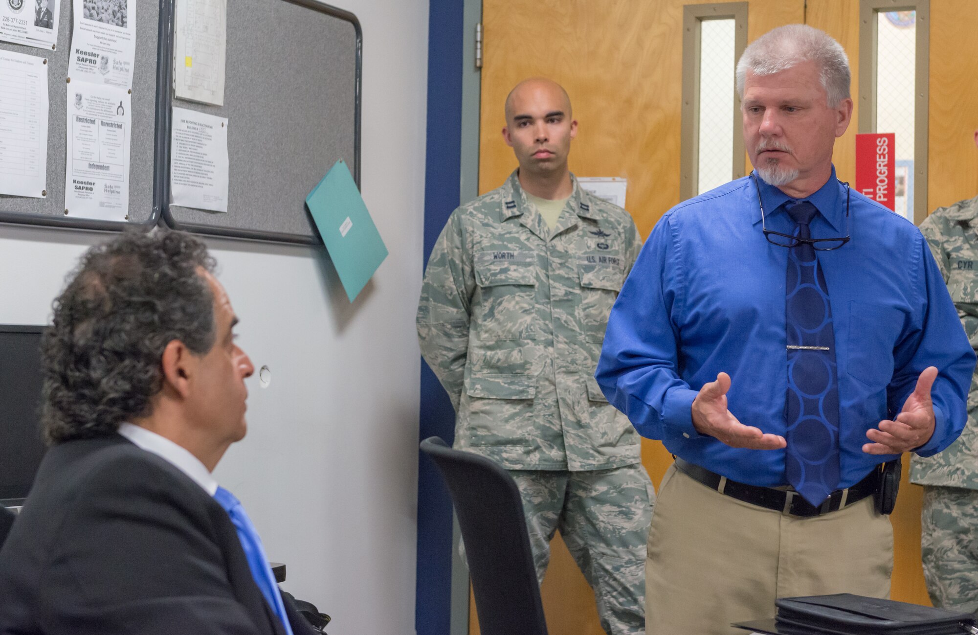 Mike Ritter, 335th Training Squadron resource chief, briefs Masoud Rasti, Headquarters Air Education and Training Command business relations manager, on the relationship between the training group and the University of Southern Mississippi in Allee Hall at Keesler Air Force Base, Mississippi, May 8, 2018. Rasti’s visit was to gauge current technology, training and to discuss what issues could be solved through funding. (U.S. Air force photo by Andre’ Askew)