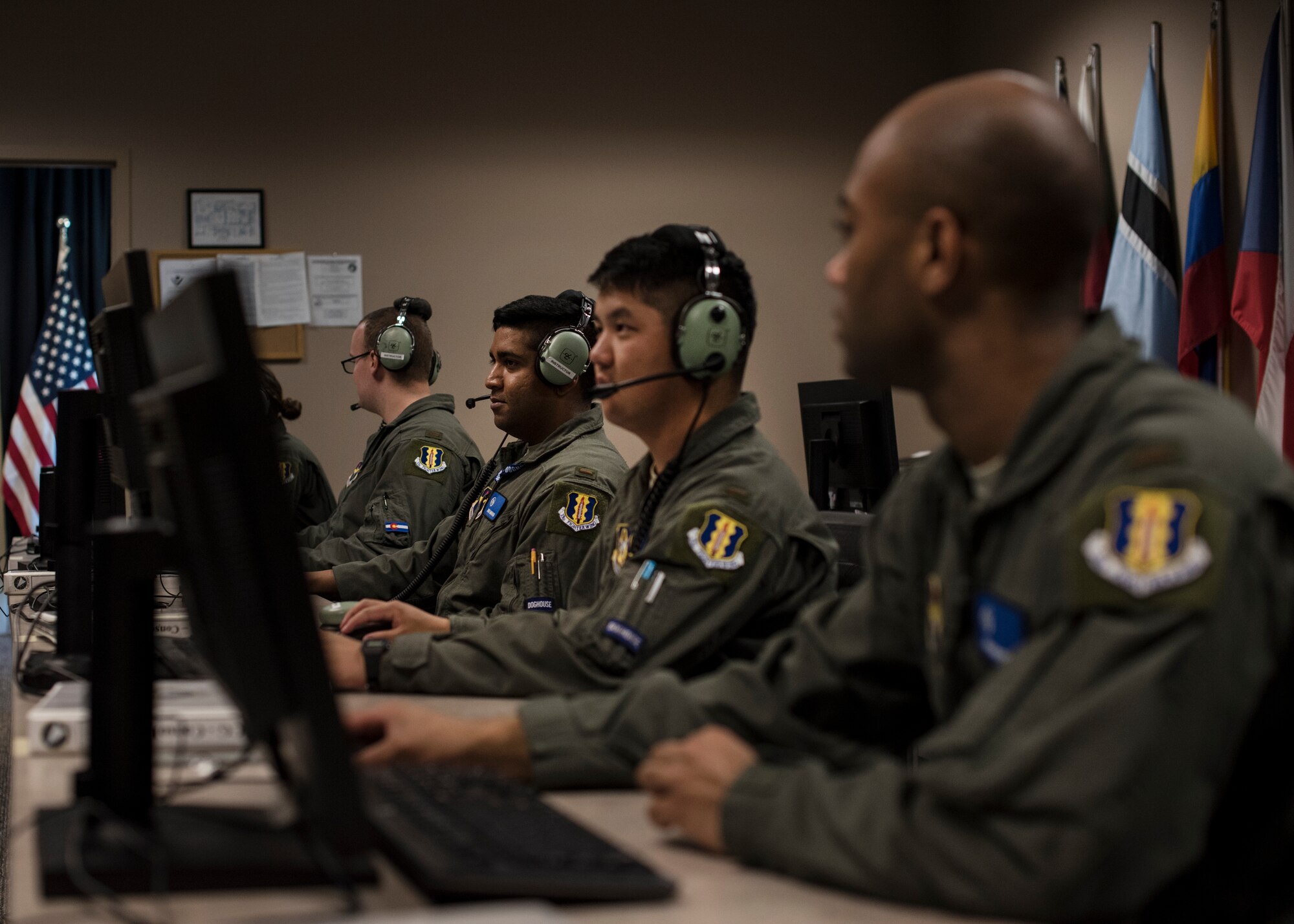 Air battle manager students assigned to the 337th Air Control Squadron accomplish a task April 18, 2018, at Tyndall Air Force Base, Fla. These students are taught to think outside the box and foster creativity to execute assignments in better, more precise ways. (U.S. Air Force photo by Airman 1st Class Emily Smallwood)