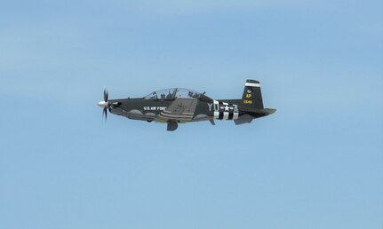 Capt. Kais Heimburger, 455th FTS instructor pilot and Lt. Col. Nik Stathopoulos, 455th FTS director of operations fly a T-6 Texan ll aircraft with  WWII-era B-26 Marauder paint scheme, May 8, 2018 at Joint Base San Antonio-Randolph.  The aircraft is assigned to the 455th Flying Training Squadron at NAS Pensacola, Florida.  (U.S. Air Force photo by Joel Martinez)