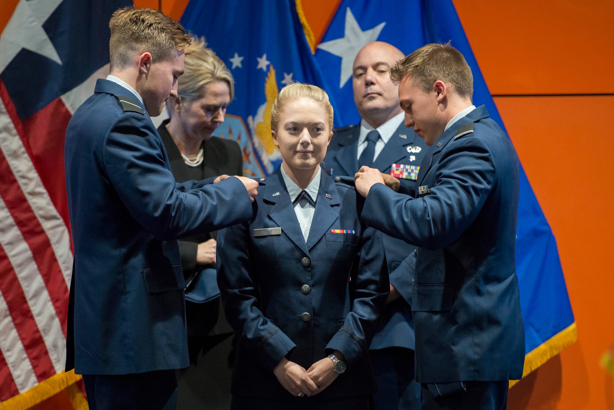 Cadet Alexandra Duhaime, Air Force Reserve Officer Training Corps Detachment 842, has her second lieutenant rank pinned on by her brothers, Brian and Michael, during her commissioning ceremony May 10, 2018, at the University of Texas San Antonio.  Air Force ROTC is one of the three primary commissioning sources for officers in the United States Air Force, the other two being the United States Air Force Academy and Air Force Officer Training School. (U.S. Air Force photo by Sean M. Worrell)