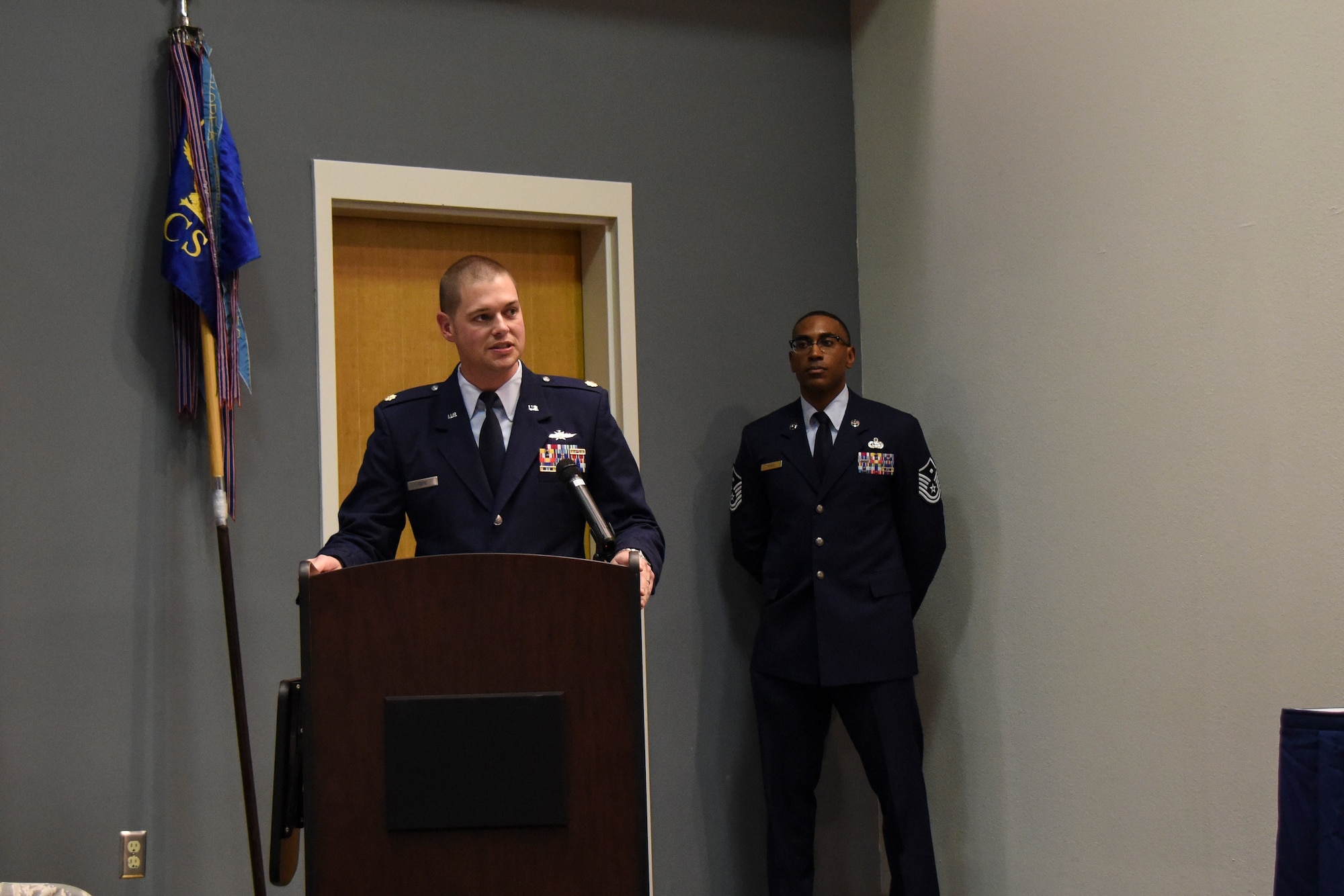 U.S. Air Force Maj. David Coté, 17th Communications Squadron commander, speaks to the crowd during the change of command ceremony in the Event Center on Goodfellow Air Force Base, Texas, May 10, 2018. Coté thanked those in attendance including his family as well as members of the 17th CS, and spoke on his gratitude towards them as their new commander. (U.S. Air Force photo by Airman 1st Class Zachary Chapman/Released)