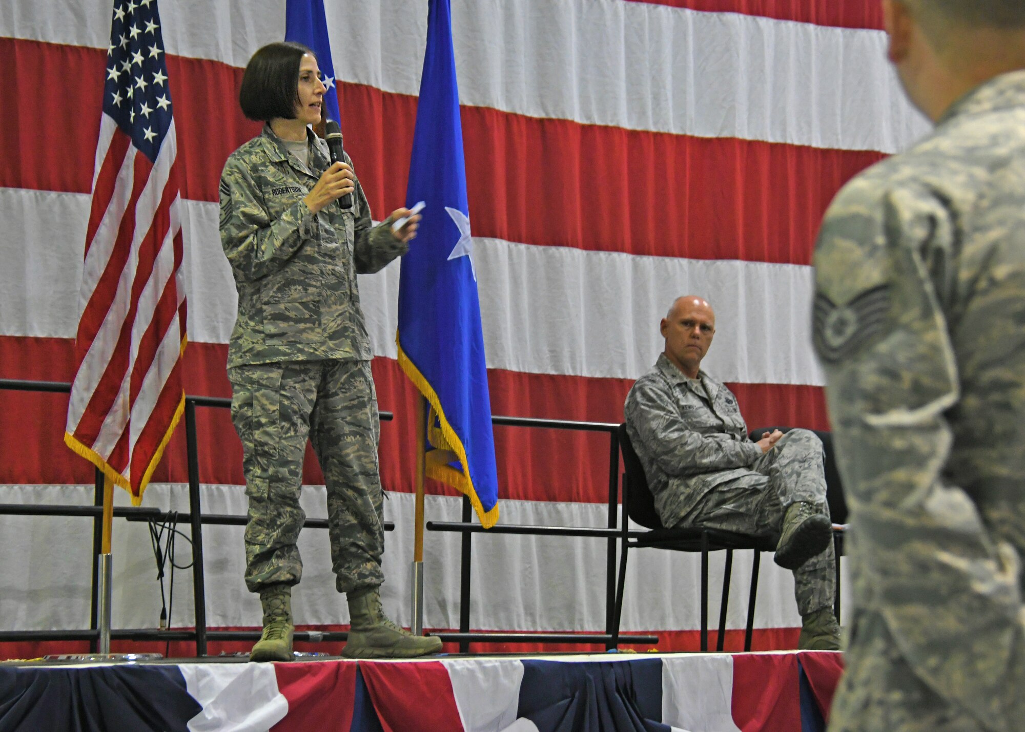 Chief Master Sgt. Vicki Robertson, 94th Airlift Wing command chief, addresses Airmen at a commander’s call last weekend. Robertson recently became the command chief for the wing. (U.S. Air Force photo/Staff Sgt. Miles Wilson)