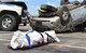 A student performer lays in a body bag during Freshman Impact at Douglas High School, Box Elder S.D., May 9, 2018. This event teaches young adults about the dangers of driving under the influence and distracted driving so they can make better decisions while behind the wheel. (U.S.  Air Force photo by Airman 1st Class Thomas Karol)