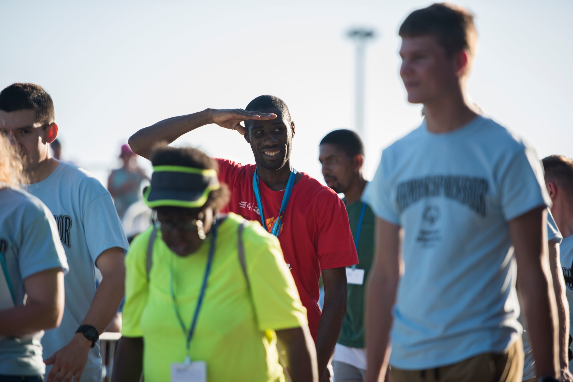 A Special Olympics Mississippi athlete renders a salute during the SOMS 2018 Summer Games opening ceremony at the Levitow Training Support Facility drill pad at Keesler Air Force Base, Mississippi, May 11, 2018. Founded in 1968, Special Olympics hosts sporting events around the world for people of all ages with special needs to include more than 700 athletes from Mississippi. (U.S. Air Force photo by Senior Airman Travis Beihl)