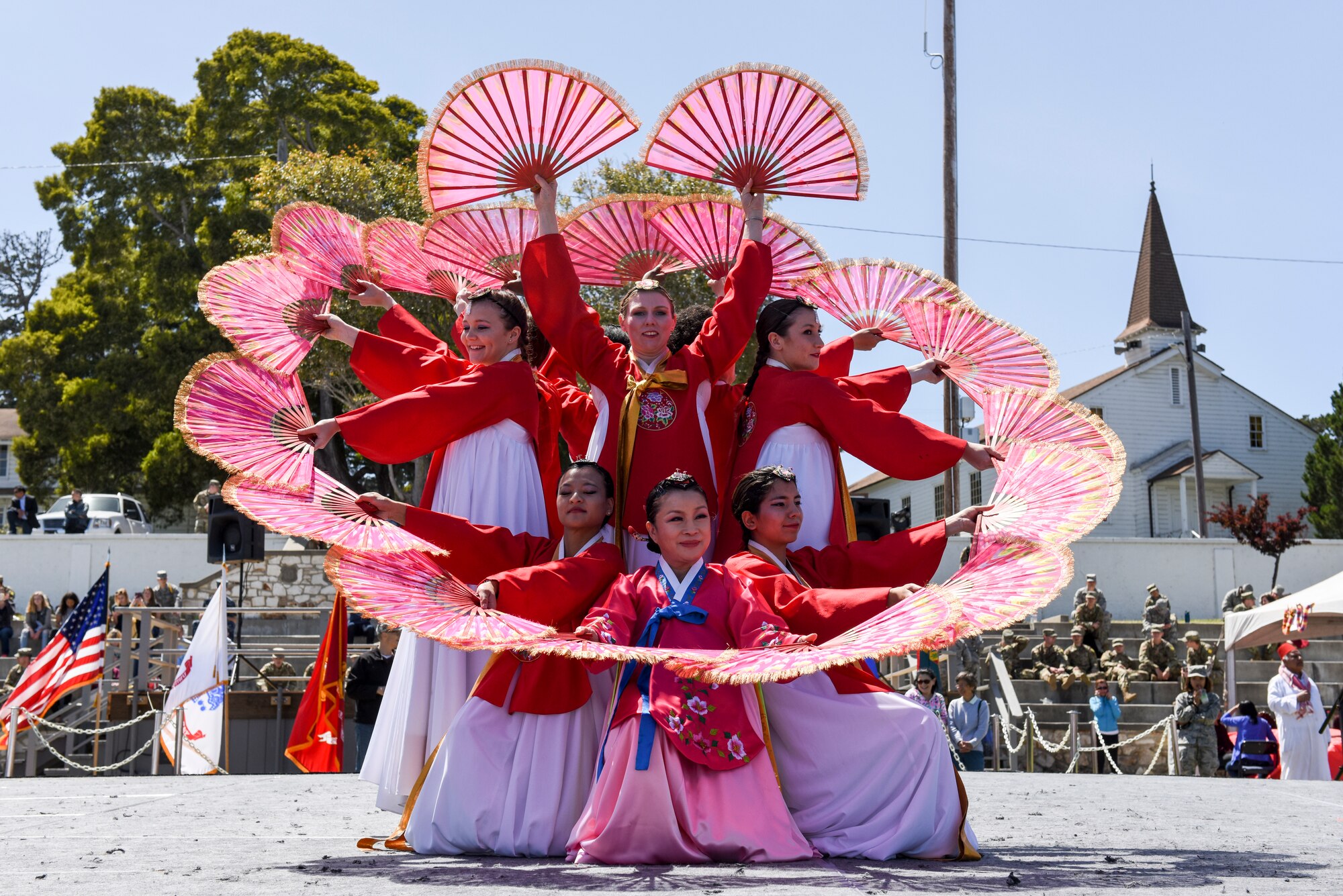 Students and faculty perform the Korean Fan Dance during the Defense Language Institute Foreign Language Center Language Day at the Presideo of Monterey, California, May 11, 2018. Students learned and practiced traditional dances for months prior to Language Day.