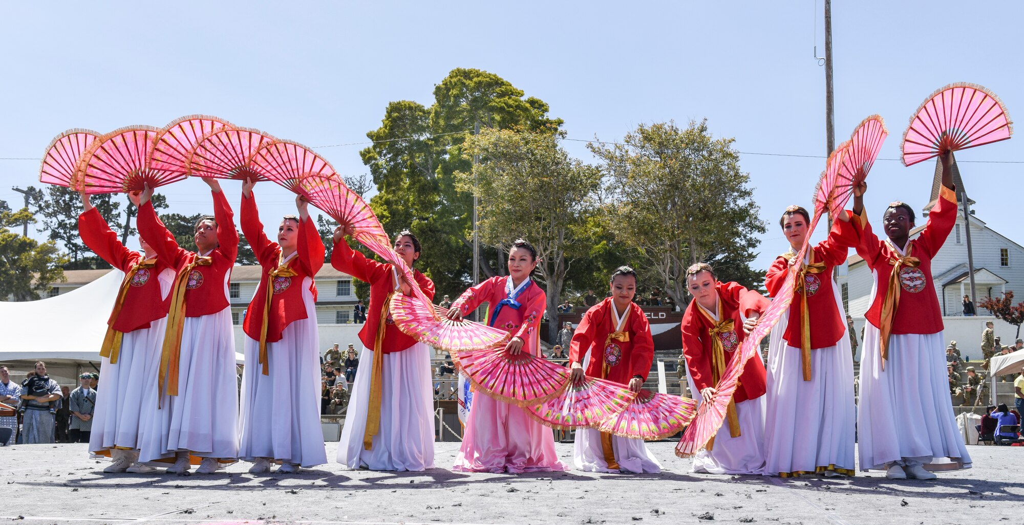 Students and faculty perform the Korean Fan Dance during the Defense Language Institute Foreign Language Center Language Day at the Presideo of Monterey, California, May 11, 2018. This was one of 48 performances that took place during Language Day that showcased various cultures and traditions throughout the world.